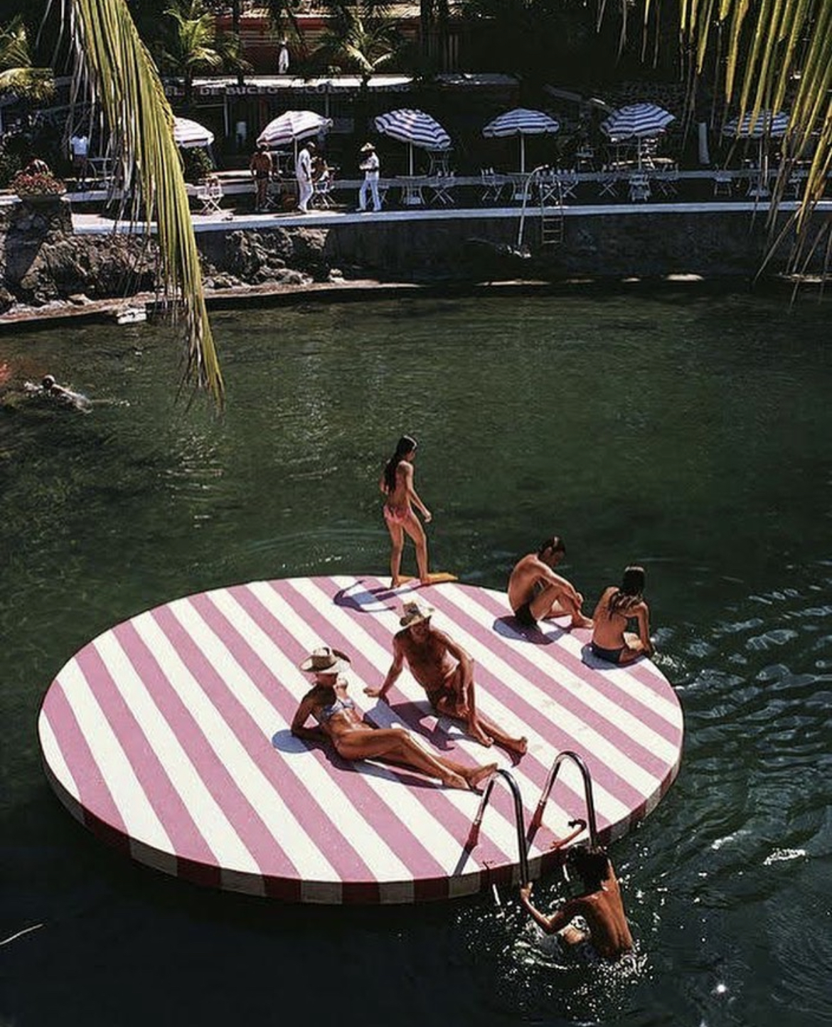 Slim Aarons - pink stripes sunbathing