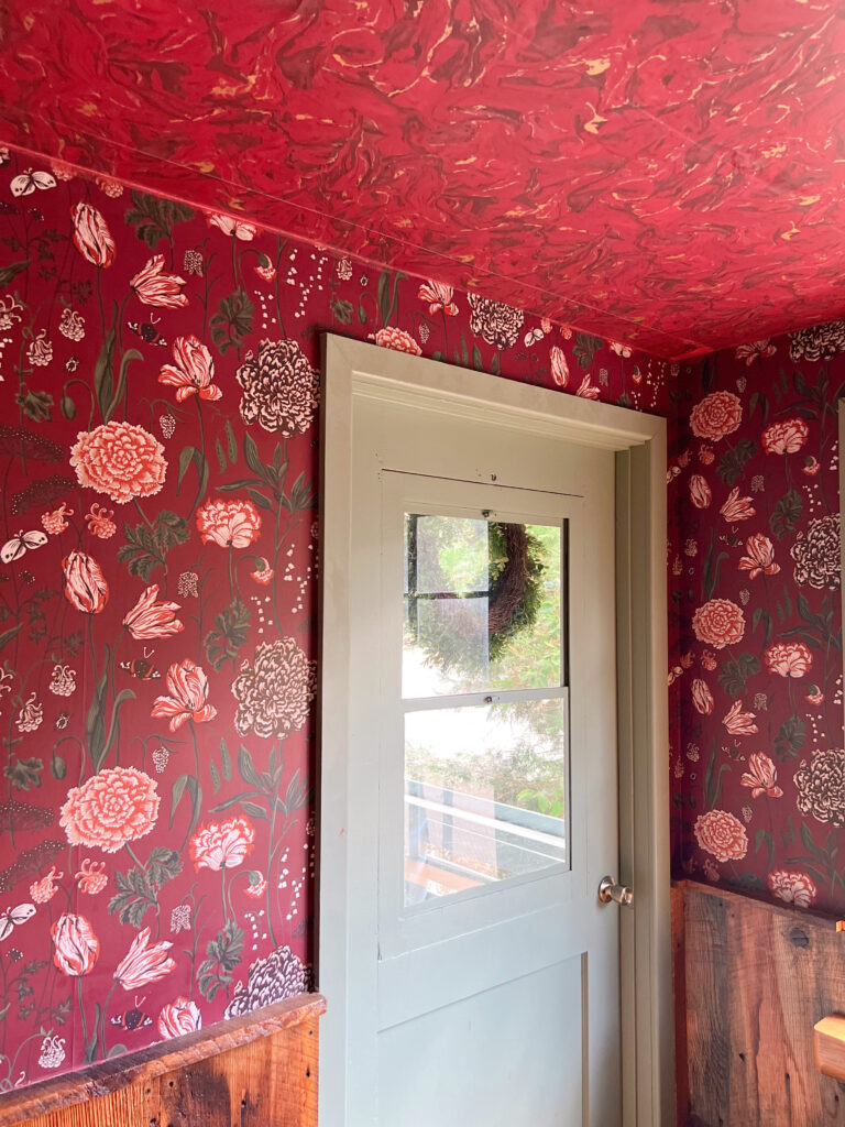 Hollyhock Cabin red floral wallpaper mudroom 